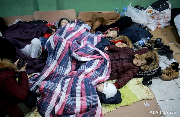 A picture taken on March 1, 2020. Refugees sleep in a makeshift refugee centre established in Edirne region, at the Turkish-Greek border. Migrants and refugees hoping to enter Greece from Turkey appeared to be fanning ou...