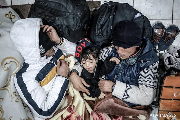 A picture taken on March 1, 2020. Refugees sleep in a makeshift refugee centre established in Edirne region, at the Turkish-Greek border. Migrants and refugees hoping to enter Greece from Turkey appeared to be fanning ou...