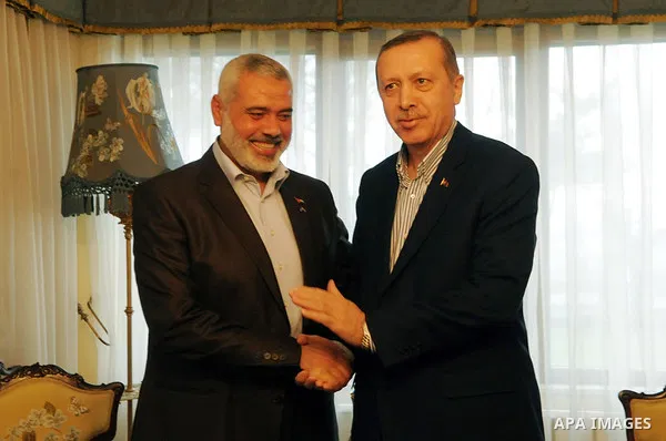 Palestinian Prime Minister of Gaza Ismail Haniya (L) shaking hands with Turkish Prime Minister Recep Tayyip Erdogan upon his arrival for a meeting in Istanbul on January 1, 2012. Haniya is a regional tour for the first t...