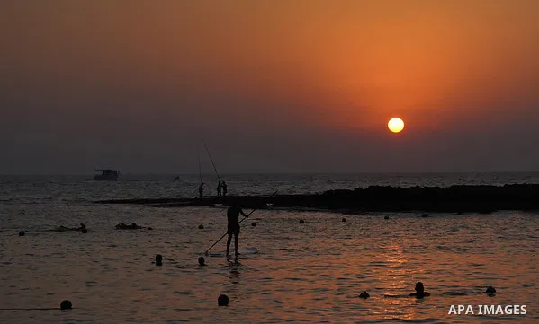 Lebanese enjoy at the beach of Batroun, North Lebanon on September 6, 2020. Photo by Mohammed Othman