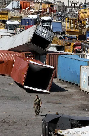 A picture shows damaged buildings in Beirut on August 10, 2020, in the aftermath of a colossal explosion that occurred days prior due to a huge pile of ammonium nitrate that had languished for years at a port warehouse....