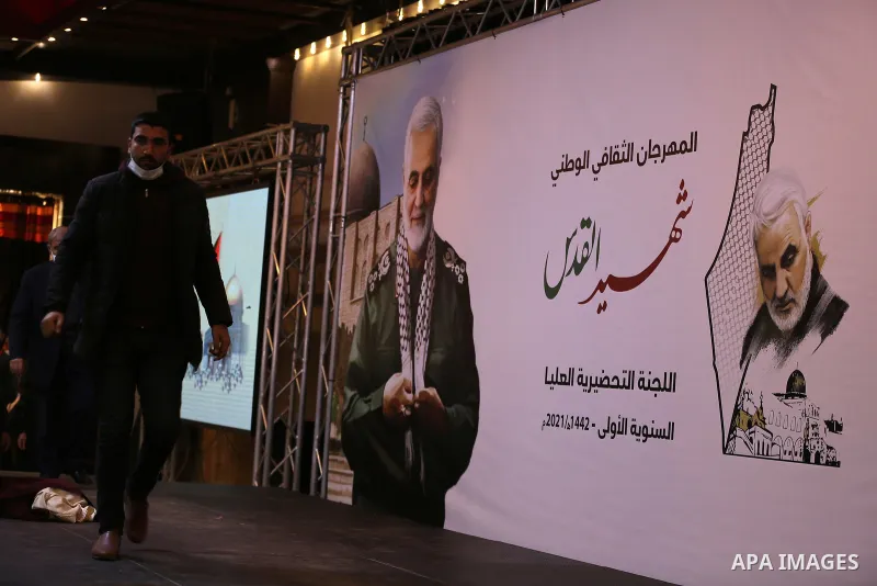 Palestinians attend the first anniversary of the death of the commander of the general Qasim Soleimani, in Gaza City on January 4, 2020. One year after US forces assassinated Iran’s most storied commander, tensions are b...