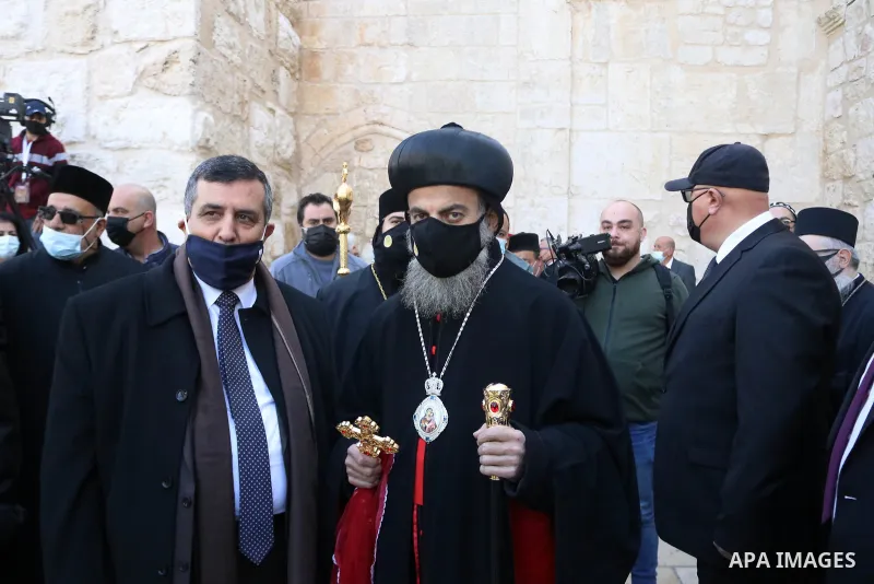 Greek Orthodox Patriarch of Jerusalem Theophilos III, walks toward the Church of the Nativity in the West Bank city of Bethlehem, as Orthodox Christians celebrate Christmas, on January 6, 2021. The Eastern Orthodox Churc...