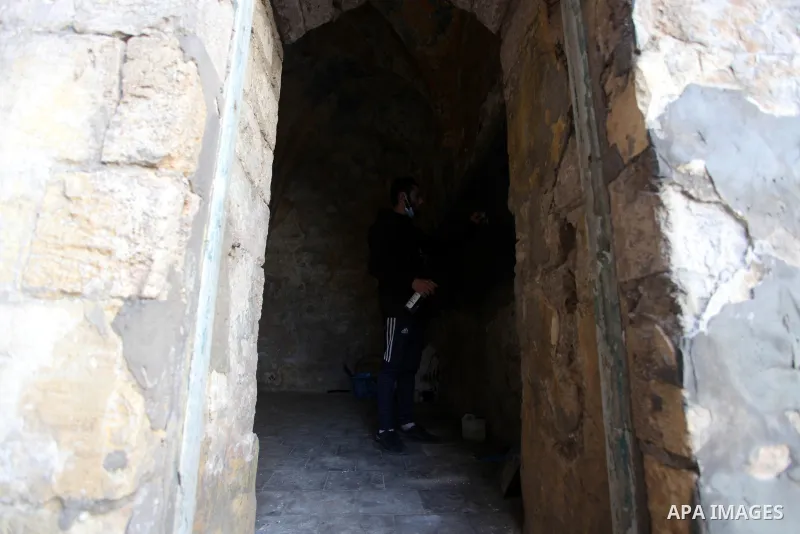 Palestinian volunteers renovate and cleen the Kemaliya Archaeological School in Gaza City, on January. 7, 2021. The Kemaliya Archaeological School which dates back to 800 AD. Palestinian youth participated in an initiati...