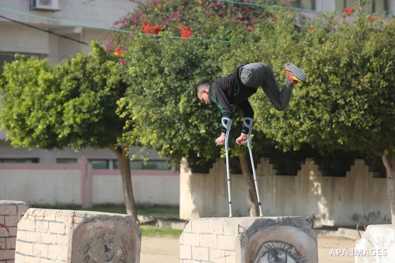 Palestinian youths who lost their legs, practice parkour in Gaza City on January 7, 2021. According to official statistics from the Palestinian Census Bureau, about 48,000 people in Gaza, or about 2.4 percent of the popu...