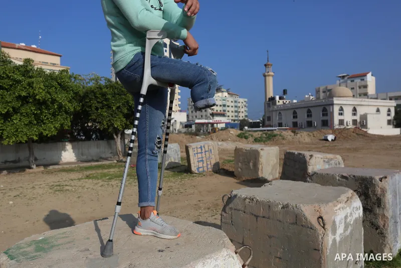Palestinian youths who lost their legs, practice parkour in Gaza City on January 7, 2021. According to official statistics from the Palestinian Census Bureau, about 48,000 people in Gaza, or about 2.4 percent of the popu...