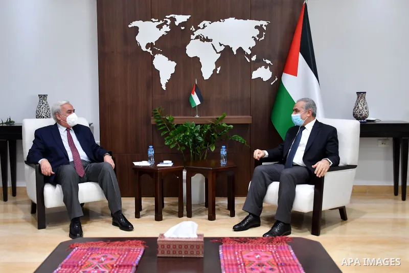 Palestinian Prime Minister Mohammad Ishtayeh, receive the annual performance report of the Water Sector Regulatory Council for the year 2020, in the West Bank city of Ramallah, on January 10, 2021. Photo by Prime Ministe...
