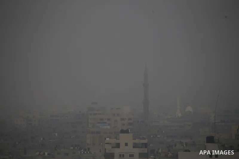 A general view shows the Gaza city during a heavy fog, in Gaza city, on January 10, 2021. Photo by Osama Baba