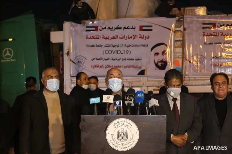 Ashraf Gomaa, a Fatah member of the Palestinian Legislative Council, speaks during a press conference during the entry of medical aid from the United Arab Emirate, in Rafah border crossing in the southern of Gaza Strip,...