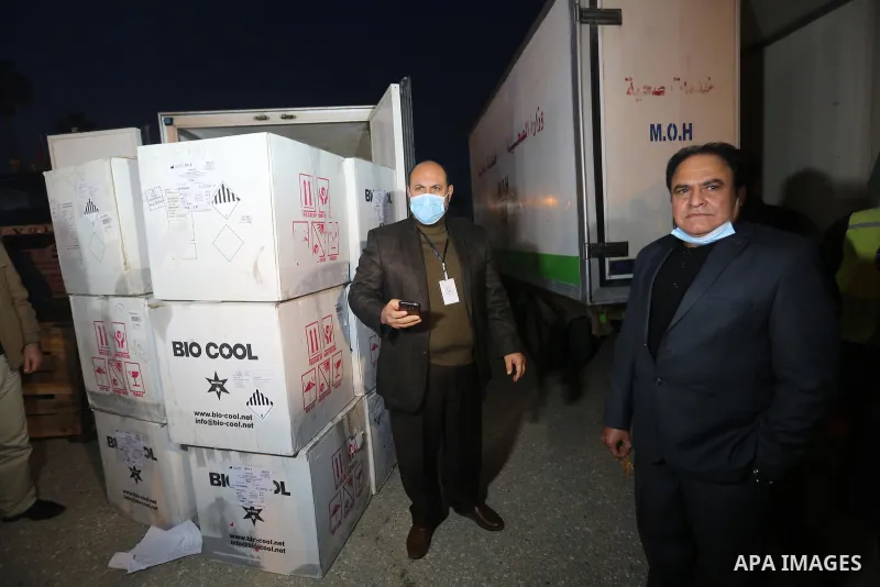 Palestinians receive medical aid from the United Arab Emirate, in Rafah border crossing in the southern of Gaza Strip, on January 10, 2021. The second shipment of Emirati medical aid arrived in the Gaza Strip this evenin...