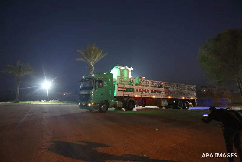 Palestinians receive medical aid from the United Arab Emirate, in Rafah border crossing in the southern of Gaza Strip, on January 10, 2021. The second shipment of Emirati medical aid arrived in the Gaza Strip this evenin...