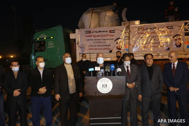 Ashraf Gomaa, a Fatah member of the Palestinian Legislative Council, speaks during a press conference during the entry of medical aid from the United Arab Emirate, in Rafah border crossing in the southern of Gaza Strip,...