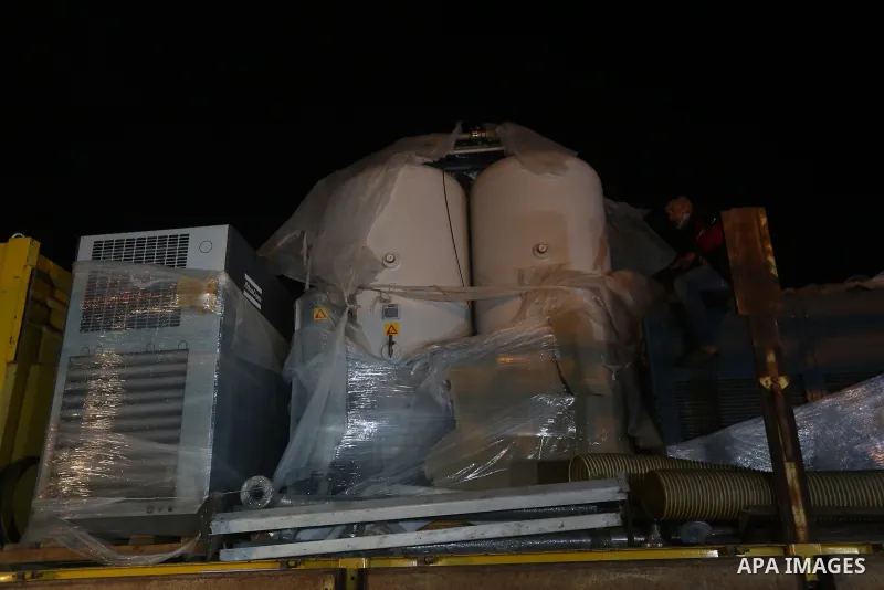 Palestinians receive medical aid from the United Arab Emirate, in Rafah border crossing in the southern of Gaza Strip, on January 10, 2021. The second shipment of Emirati medical aid arrived in the Gaza Strip this evenin...