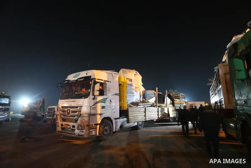 Palestinians receive medical aid from the United Arab Emirate, in Rafah border crossing in the southern of Gaza Strip, on January 10, 2021. The second shipment of Emirati medical aid arrived in the Gaza Strip this evenin...