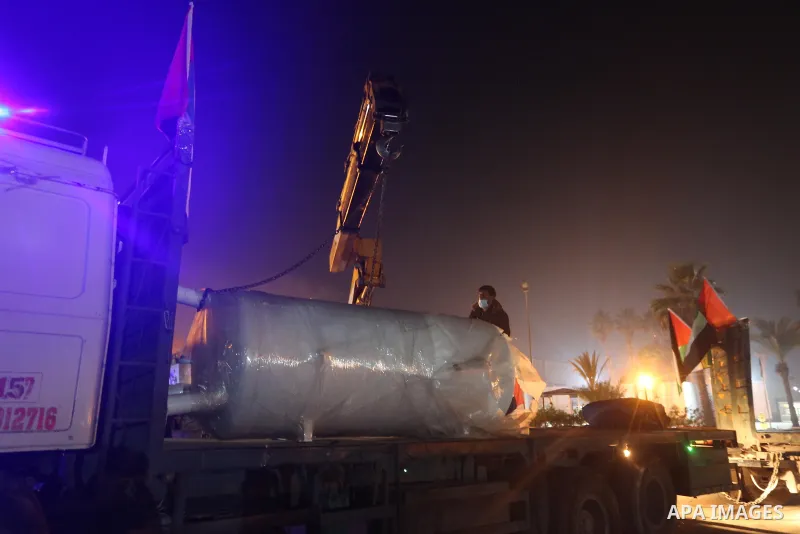 Palestinians receive medical aid from the United Arab Emirate, in Rafah border crossing in the southern of Gaza Strip, on January 10, 2021. The second shipment of Emirati medical aid arrived in the Gaza Strip this evenin...