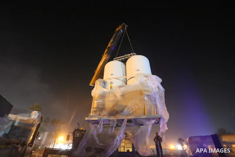 Palestinians receive medical aid from the United Arab Emirate, in Rafah border crossing in the southern of Gaza Strip, on January 10, 2021. The second shipment of Emirati medical aid arrived in the Gaza Strip this evenin...