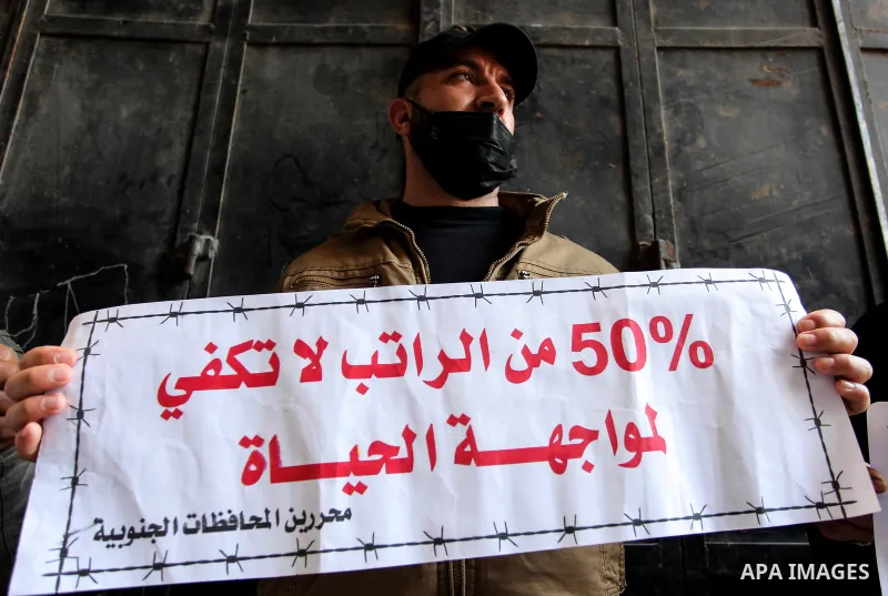 Freed Palestinian prisoners, take part in a protest to demand their rights and salaries, in Gaza city, January 11, 2021. The worst year for prisoners in Israeli jails where some 4,400 Palestinians are currently incarcera...