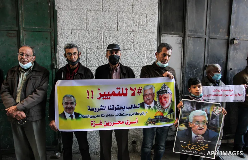 Freed Palestinian prisoners, take part in a protest to demand their rights and salaries, in Gaza city, January 11, 2021. The worst year for prisoners in Israeli jails where some 4,400 Palestinians are currently incarcera...