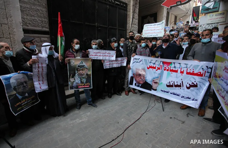 Freed Palestinian prisoners, take part in a protest to demand their rights and salaries, in Gaza city, January 11, 2021. The worst year for prisoners in Israeli jails where some 4,400 Palestinians are currently incarcera...