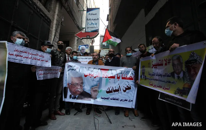 Freed Palestinian prisoners, take part in a protest to demand their rights and salaries, in Gaza city, January 11, 2021. The worst year for prisoners in Israeli jails where some 4,400 Palestinians are currently incarcera...