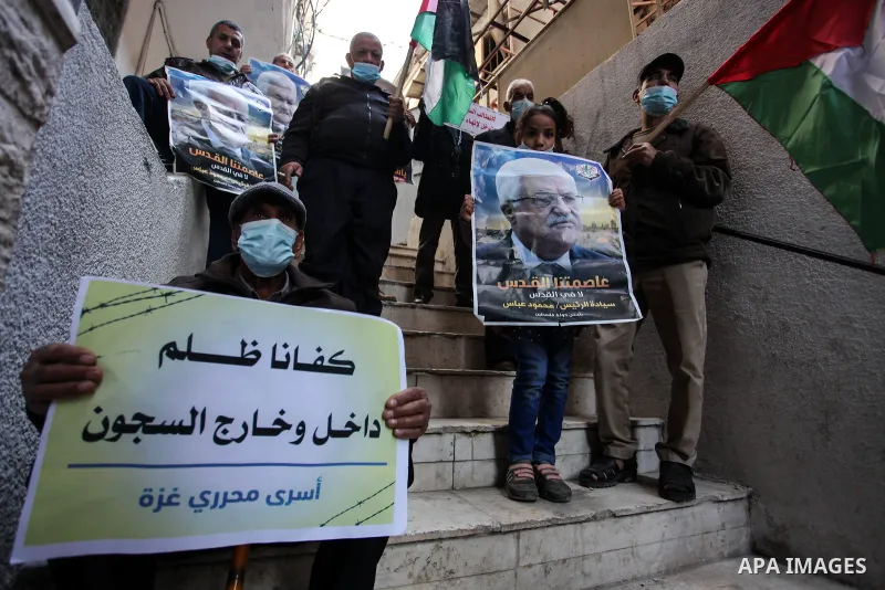 Freed Palestinian prisoners, take part in a protest to demand their rights and salaries, in Gaza city, January 11, 2021. The worst year for prisoners in Israeli jails where some 4,400 Palestinians are currently incarcera...