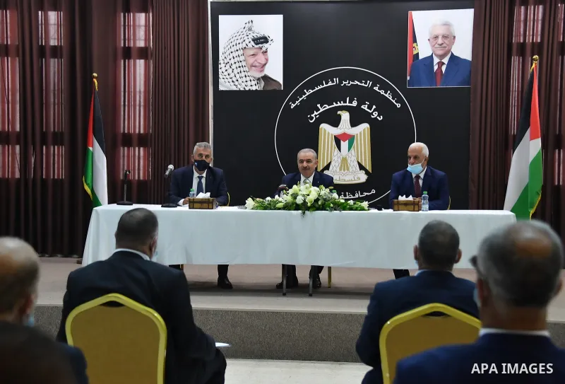 Palestinian Prime Minister Mohammad Ishtayeh, meets with members of the civil and security governorate, in the West Bank city of Hebron, on January 13, 2021. Photo by Prime Minister Office