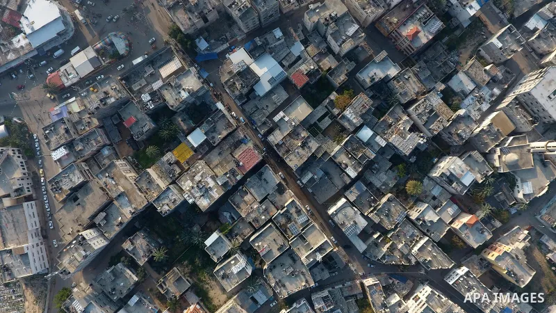 This picture taken on January 16, 2021, shows an aerial view of the Deir al-Balah refugee camp in the central Gaza Strip, during a complete closure amid the spread of the Coronavirus COVID-19. In the Sixth week after the...