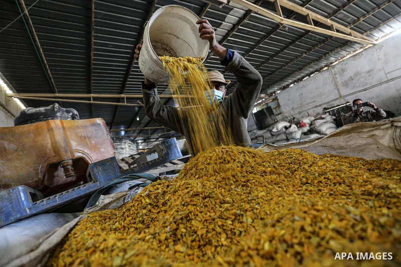 Palestinian workers reuses plastic to produce water hoses and toys for childrenat a factory, in Khan Younis in the southern Gaza Strip on January 18, 2021. According to the most recent November UNCTAD report (2020), Gaza...