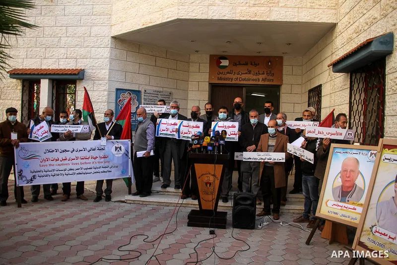 Palestinians attend a press confernce about the spread of the coronavirus disease (COVID-19) in Israeli jails, in Gaza city on January 19, 2021. According to the Palestinian Prisoners’ Club, about 250 Palestinians in Isr...