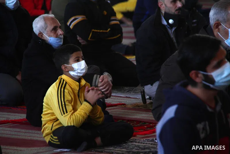 Palestinian Muslim worshipers attend Friday prayers in a mosque after the coronavirus disease (COVID-19) restrictions eased, in Gaza City January 22, 2021. Yesterday, the Ministry of Interior announced a series of measur...