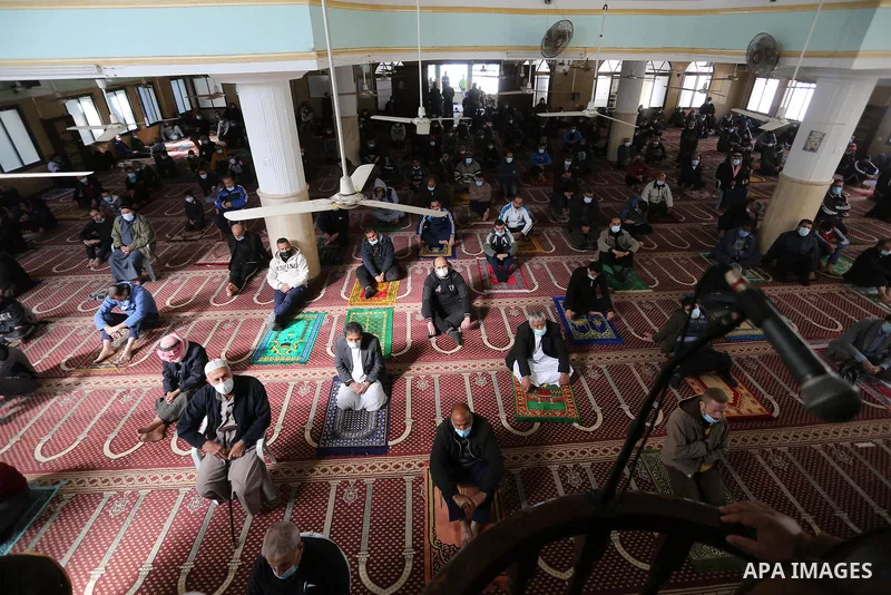 Palestinian Muslim worshipers attend Friday prayers in a mosque after the coronavirus disease (COVID-19) restrictions eased, in Deir al-Balah, central of Gaza Strip, on January 22, 2021. Yesterday, the Ministry of Interi...
