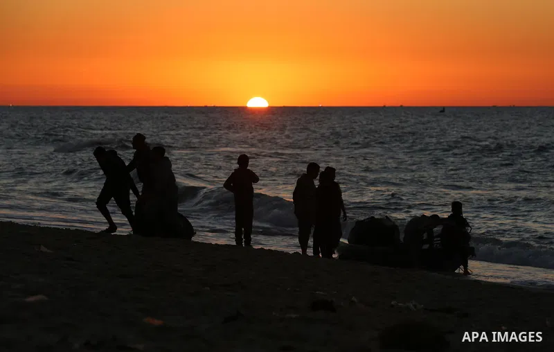 Palestinians enjoy their time on the beach after the coronavirus disease (COVID-19) restrictions eased, in Deir Al-Balah in the center of the Gaza Strip on January 23, 2021, the Ministry of Interior announced a series of...