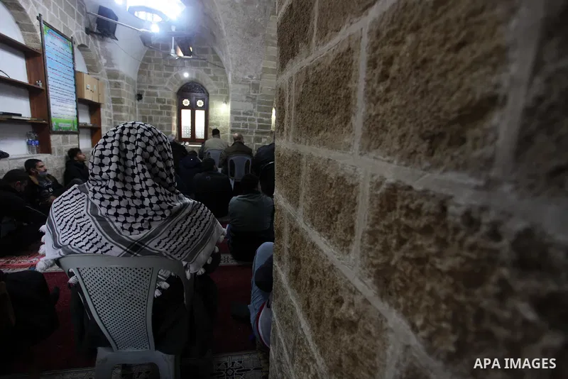Palestinian Muslim worshipers attend Friday prayers in a mosque after the coronavirus disease (COVID-19) restrictions eased, in Gaza City, on January 29, 2021. The Ministry of Interior announced a series of measures to a...
