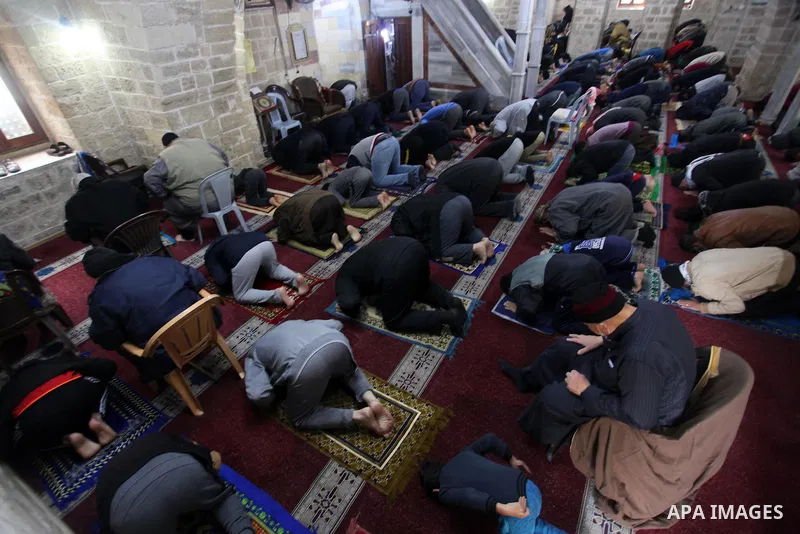 Palestinian Muslim worshipers attend Friday prayers in a mosque after the coronavirus disease (COVID-19) restrictions eased, in Gaza City, on January 29, 2021. The Ministry of Interior announced a series of measures to a...