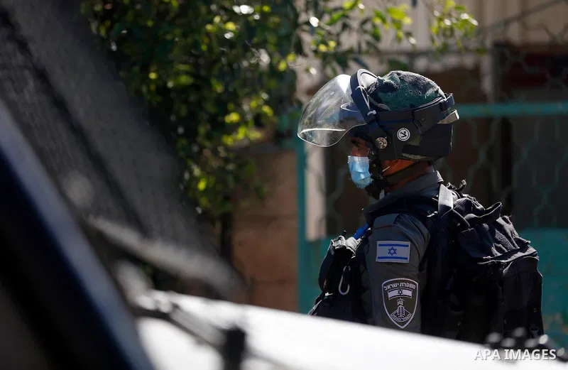 Israeli security forces stand guard near the house of Palestinian Mohammed Kabaha, who was allegedly accused by the Israeli occupation of killing an Israeli settler in late December 2020, as they prepare to blow it up, i...