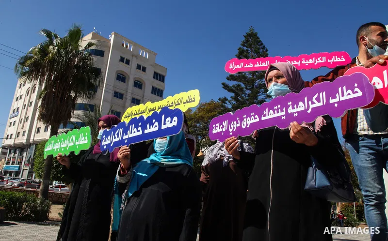 Palestinians from "PCDCR" take part in a protest against hate speech, in Gaza city, on February 11, 2021. Project a protective environment of hate speech and supportive of freedom of opinion and expression in the Gaza St...