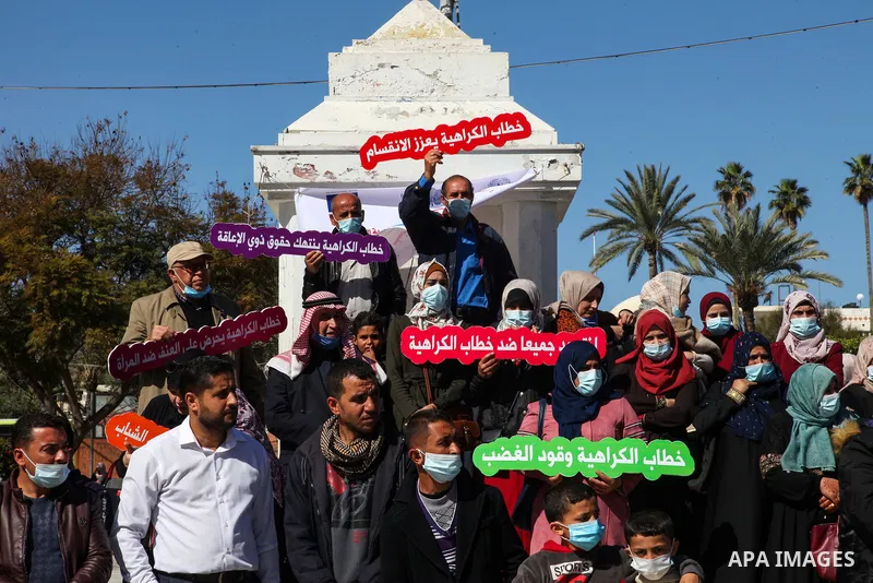 Palestinians from "PCDCR" take part in a protest against hate speech, in Gaza city, on February 11, 2021. Project a protective environment of hate speech and supportive of freedom of opinion and expression in the Gaza St...