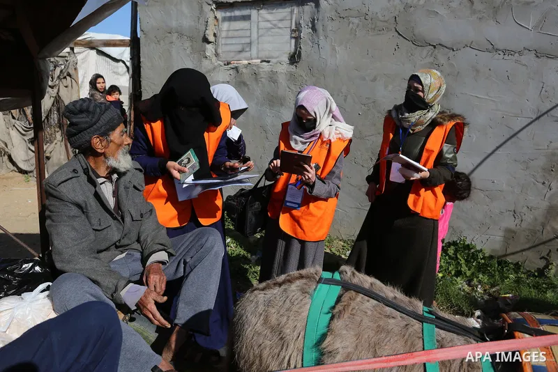 Palestinian members of Central Elections Commission register voters for the upcoming elections, at Nahr al-Bared refugee camp in Khan Younis in the southern Gaza Strip on February 11, 2021. Nahr Al-Bared is a marginalize...