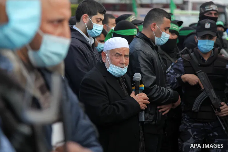 The spokesman of the parliament Ahmed Bahr, takes part in a funeral of the leader Ibrahim Al-Yazuri,80, who died of the coronavirus (COVID-19) pandemicin, Gaza City on February 12, 2021. Al-Yazuri is one of the founders...