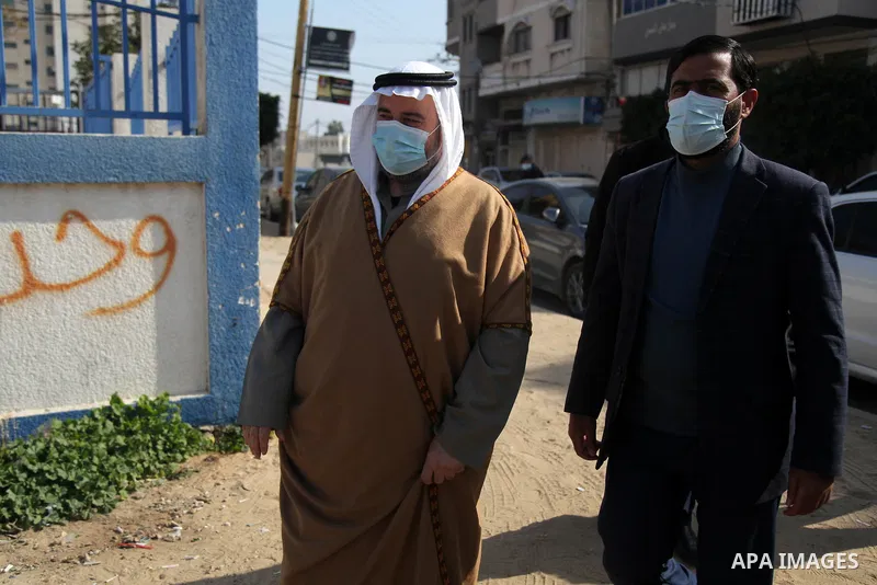 members of the Palestinian Islamist Hamas movement take part in a funeral of the leader Ibrahim Al-Yazuri,80, who died of the coronavirus (COVID-19) pandemicin, Gaza City on February 12, 2021. Al-Yazuri is one of the fou...
