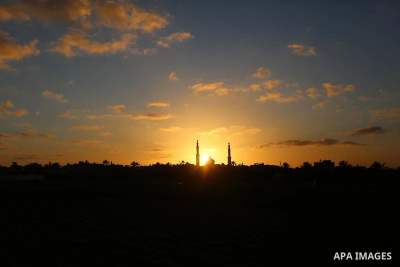 A general view show the sunset in Khan Younis in the southern of Gaza strip, on February 13, 2021. Palestine is going to be Sunny with a maximum temperature of 20°c and minimum temperature of 11°c. Expected precipitation...