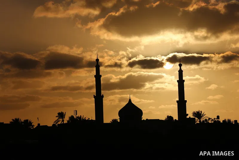 A general view show the sunset in Khan Younis in the southern of Gaza strip, on February 13, 2021. Palestine is going to be Sunny with a maximum temperature of 20°c and minimum temperature of 11°c. Expected precipitation...
