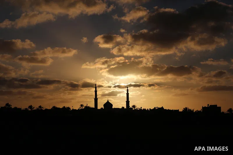 A general view show the sunset in Khan Younis in the southern of Gaza strip, on February 13, 2021. Palestine is going to be Sunny with a maximum temperature of 20°c and minimum temperature of 11°c. Expected precipitation...