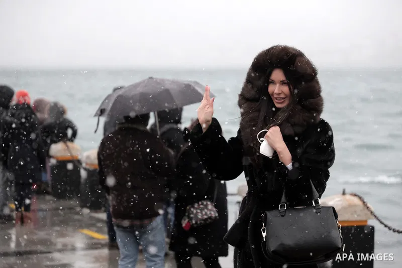 People enjoy during a snowy day in Istanbul, Turkey, on 15 February 2021. Temperature dropped to as low as two degrees Celsius on 15 February while the Turkish State Meteorological Service (TSMS) said Istanbul will witne...