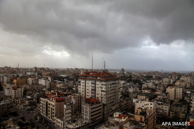 A general view shows the Gaza city during a stormy day, on February 17, 2021. The cloudy, stormy and very cold conditions are expected to continue on Thursday. Scattered torrential rain showers with thunderstorms and occ...
