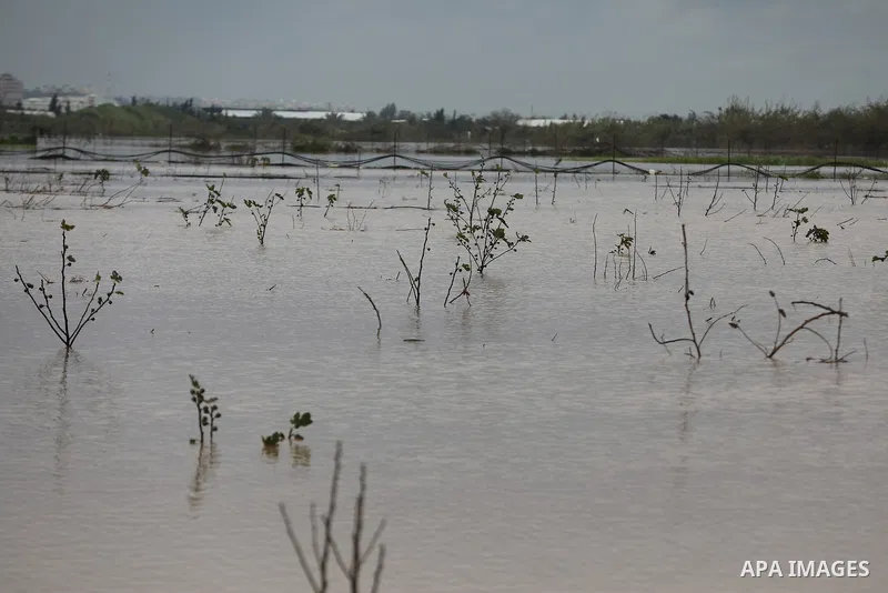 A general view show the agricultural lands after it was flooded by rain water, near the border, east of Gaza City, on February 18, 2021. Palestinian authorities said the Israeli army opened the floodgates of a canal lead...