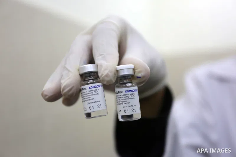 A Palestinian health worker prepares a shot of the Russian Sputnik V coronavirus vaccine at European Hospital, in Khan Yunis, in the southern Gaza Strip on February 23, 2021. Around 20,000 coronavirus vaccine doses from...