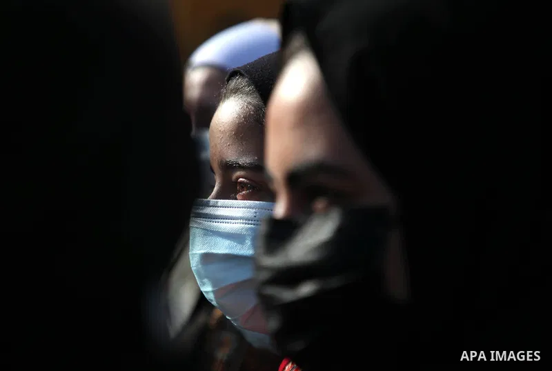 Palestinian students wearing protective face masks, return back to their school, in the morning of the first day of the second semester study, amid the coronavirus disease (COVID-19) outbreak, in Gaza city, on February 2...