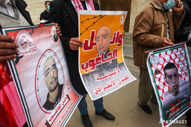 Palestinians take part in a protest to show solidarity with prisoner in Israeli jails, Ahmed Obeid, who suffers from cancer, in front of the headquarters of Red cross in Gaza city, on March 01, 2021. The Detainees and Ex...