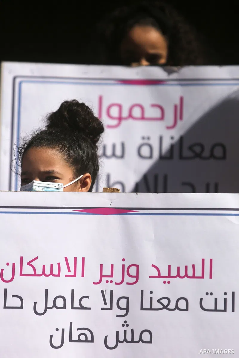 Residents of the Italian tower take part in the protest against the stalling of the Minister of Housing and Works in the decision to build the tower, in Gaza city on March 6, 2021. The Italian tower, which was destroyed...